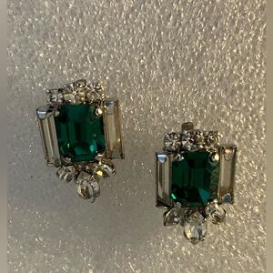 Vintage emerald and clear colored rhinestones clip on earrings.